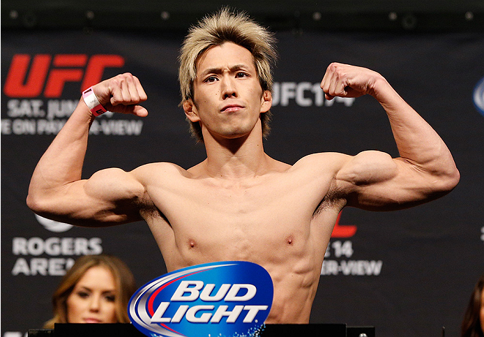 VANCOUVER, BC - JUNE 13:  Michinori Tanaka of Japan weighs in during the UFC 174 weigh-in at Rogers Arena on June 13, 2014 in Vancouver, Canada.  (Photo by Josh Hedges/Zuffa LLC/Zuffa LLC via Getty Images)