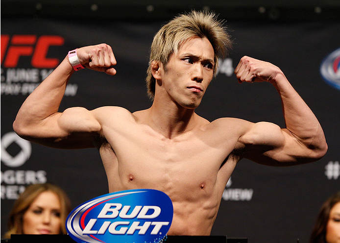 VANCOUVER, BC - JUNE 13:  Michinori Tanaka of Japan weighs in during the UFC 174 weigh-in at Rogers Arena on June 13, 2014 in Vancouver, Canada.  (Photo by Josh Hedges/Zuffa LLC/Zuffa LLC via Getty Images)