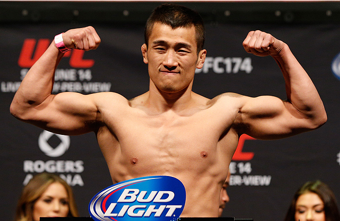 VANCOUVER, BC - JUNE 13:  Tae Hyun Bang of South Korea weighs in during the UFC 174 weigh-in at Rogers Arena on June 13, 2014 in Vancouver, Canada.  (Photo by Josh Hedges/Zuffa LLC/Zuffa LLC via Getty Images)