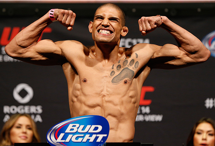 VANCOUVER, BC - JUNE 13: Kajan Johnson weighs in during the UFC 174 weigh-in at Rogers Arena on June 13, 2014 in Vancouver, Canada. (Photo by Josh Hedges/Zuffa LLC/Zuffa LLC via Getty Images)