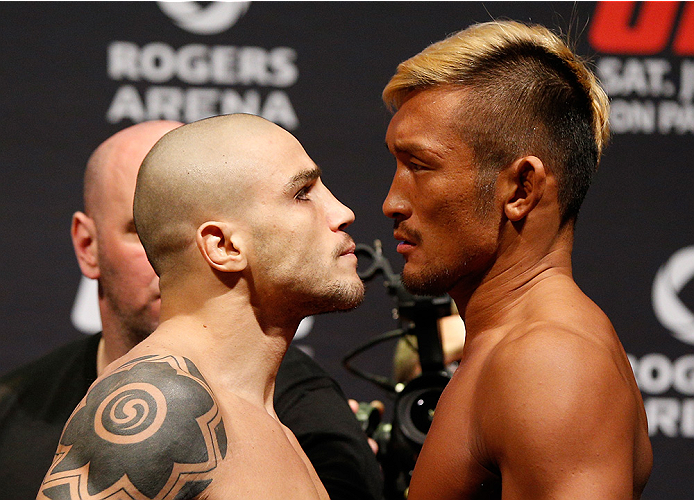 VANCOUVER, BC - JUNE 13:  (L-R) Opponents Daniel Sarafian and Kiichi Kunimoto face off during the UFC 174 weigh-in at Rogers Arena on June 13, 2014 in Vancouver, Canada.  (Photo by Josh Hedges/Zuffa LLC/Zuffa LLC via Getty Images)