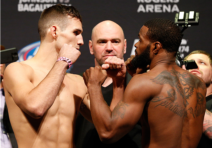 VANCOUVER, BC - JUNE 13: (L-R) Opponents Rory MacDonald and Tyron Woodley face off during the UFC 174 weigh-in at Rogers Arena on June 13, 2014 in Vancouver, Canada. (Photo by Josh Hedges/Zuffa LLC/Zuffa LLC via Getty Images)