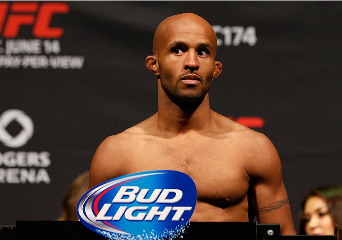 VANCOUVER, BC - JUNE 13: UFC flyweight champion Demetrious "Mighty Mouse" Johnson weighs in during the UFC 174 weigh-in at Rogers Arena on June 13, 2014 in Vancouver, Canada. (Photo by Josh Hedges/Zuffa LLC/Zuffa LLC via Getty Images)
