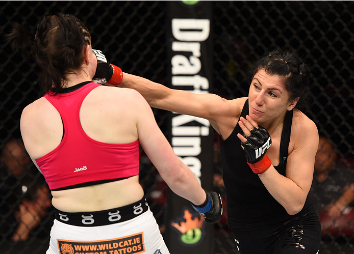 MONTREAL, QC - APRIL 25:   (R-L) Randa Markos of Canada punches Aisling Daly of Ireland in their women's strawweight bout during the UFC 186 event at the Bell Centre on April 25, 2015 in Montreal, Quebec, Canada. (Photo by Josh Hedges/Zuffa LLC/Zuffa LLC 