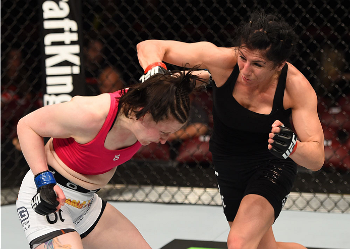 MONTREAL, QC - APRIL 25: (R-L) Randa Markos of Canada punches Aisling Daly of Ireland in their women's strawweight bout during the UFC 186 event at the Bell Centre on April 25, 2015 in Montreal, Quebec, Canada. (Photo by Josh Hedges/Zuffa LLC/Zuffa LLC