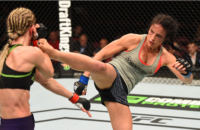 MONTREAL, QC - APRIL 25:   (R-L) Valerie Letourneau of Canada kicks Jessica Rakoczy in their women's strawweight bout during the UFC 186 event at the Bell Centre on April 25, 2015 in Montreal, Quebec, Canada. (Photo by Josh Hedges/Zuffa LLC/Zuffa LLC via 