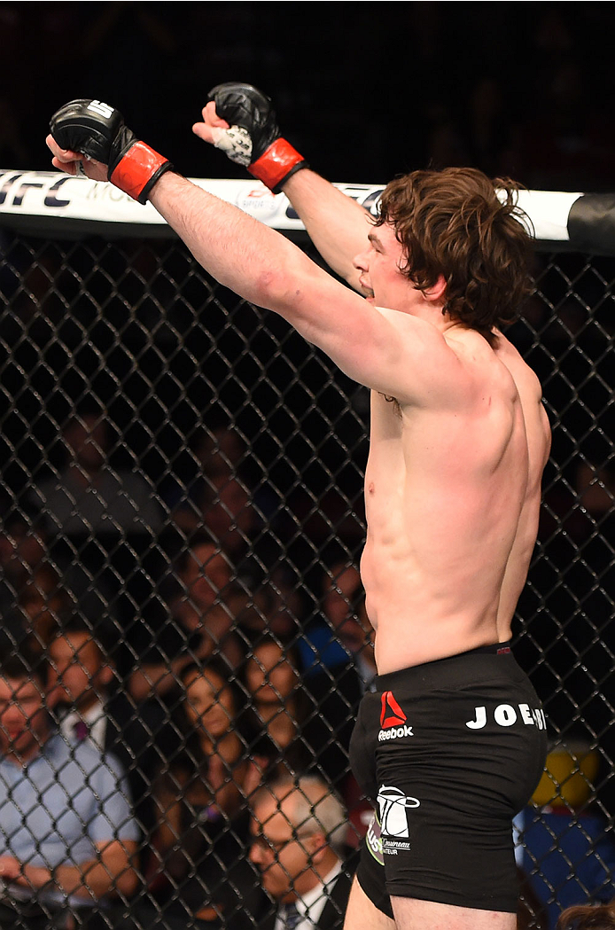 MONTREAL, QC - APRIL 25:   Olivier Aubin-Mercier of Canada reacts after his submission victory over David Michaud of the United States in their lightweight bout during the UFC 186 event at the Bell Centre on April 25, 2015 in Montreal, Quebec, Canada. (Ph