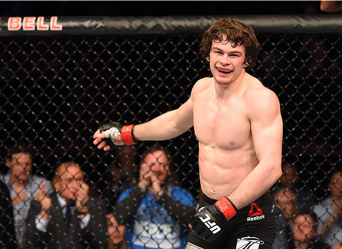 MONTREAL, QC - APRIL 25:   Olivier Aubin-Mercier of Canada reacts after his submission victory over David Michaud of the United States in their lightweight bout during the UFC 186 event at the Bell Centre on April 25, 2015 in Montreal, Quebec, Canada. (Ph