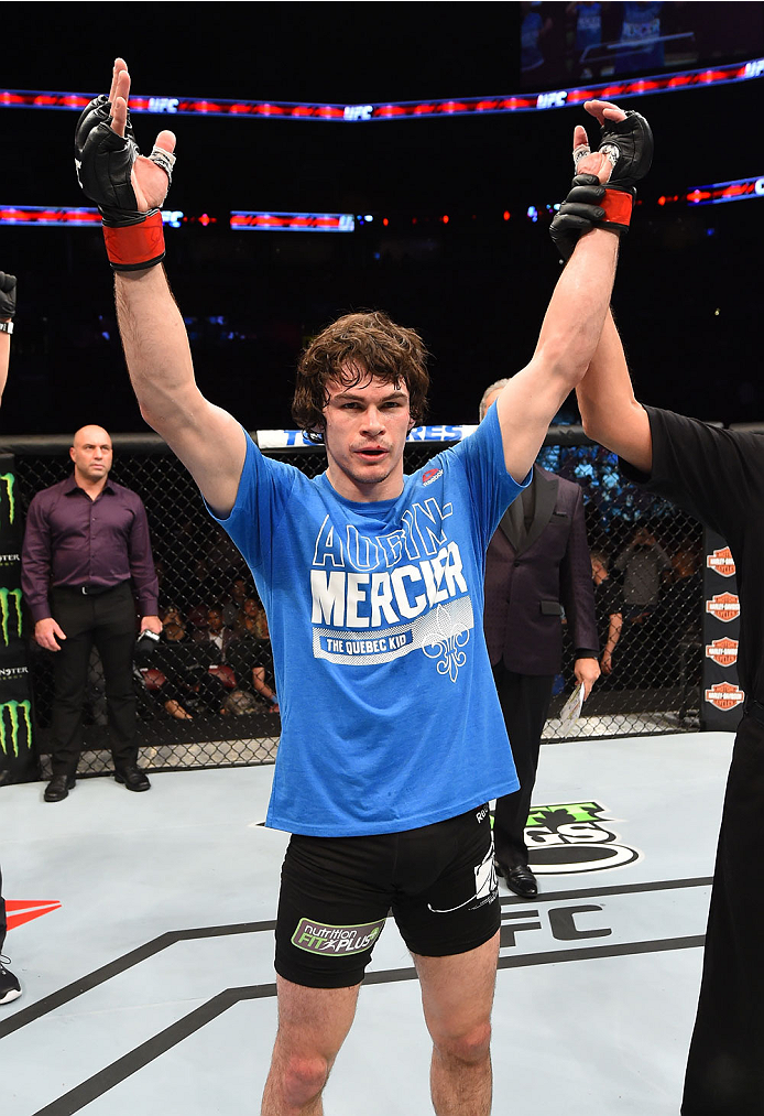 MONTREAL, QC - APRIL 25:   Olivier Aubin-Mercier of Canada reacts after his submission victory over David Michaud of the United States in their lightweight bout during the UFC 186 event at the Bell Centre on April 25, 2015 in Montreal, Quebec, Canada. (Ph