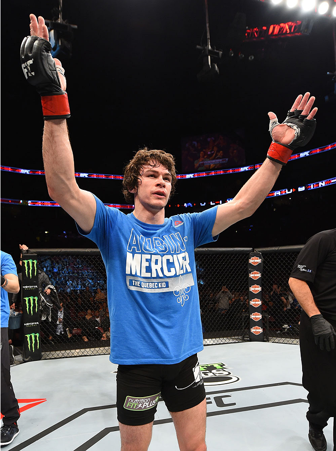 MONTREAL, QC - APRIL 25:   Olivier Aubin-Mercier of Canada reacts after his submission victory over David Michaud of the United States in their lightweight bout during the UFC 186 event at the Bell Centre on April 25, 2015 in Montreal, Quebec, Canada. (Ph