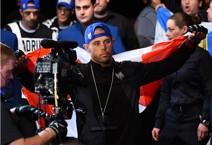 MONTREAL, QC - APRIL 25:   Chad Laprise of Canada prepares to enter the Octagon before his lightweight bout against Bryan Barberena of the United States during the UFC 186 event at the Bell Centre on April 25, 2015 in Montreal, Quebec, Canada. (Photo by J