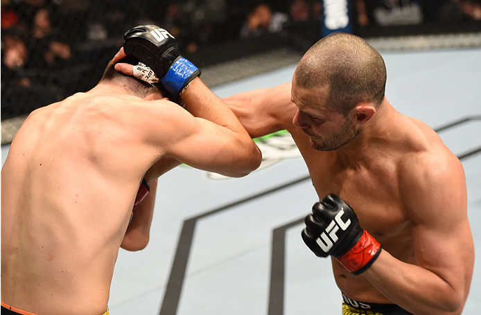 MONTREAL, QC - APRIL 25:  (R-L) Chad Laprise of Canada punches Bryan Barberena of the United States in their lightweight bout during the UFC 186 event at the Bell Centre on April 25, 2015 in Montreal, Quebec, Canada. (Photo by Josh Hedges/Zuffa LLC/Zuffa 