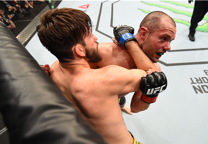 MONTREAL, QC - APRIL 25:   (R-L) Chad Laprise of Canada battles Bryan Barberena of the United States in their lightweight bout during the UFC 186 event at the Bell Centre on April 25, 2015 in Montreal, Quebec, Canada. (Photo by Josh Hedges/Zuffa LLC/Zuffa