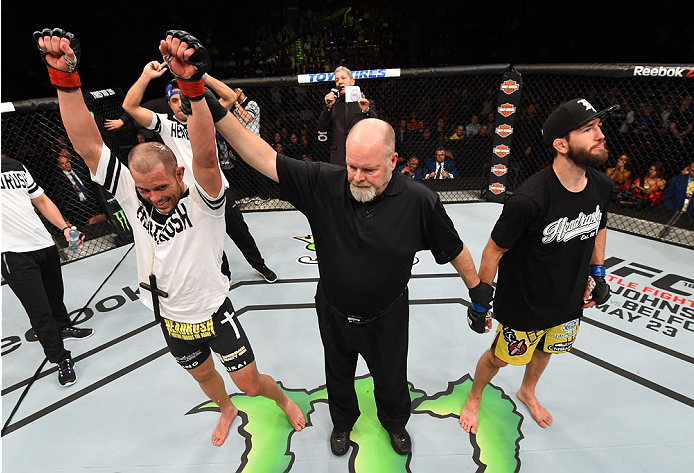 MONTREAL, QC - APRIL 25:   Chad Laprise (L) of Canada reacts after his decision victory over Bryan Barberena of the United States in their lightweight bout during the UFC 186 event at the Bell Centre on April 25, 2015 in Montreal, Quebec, Canada. (Photo b