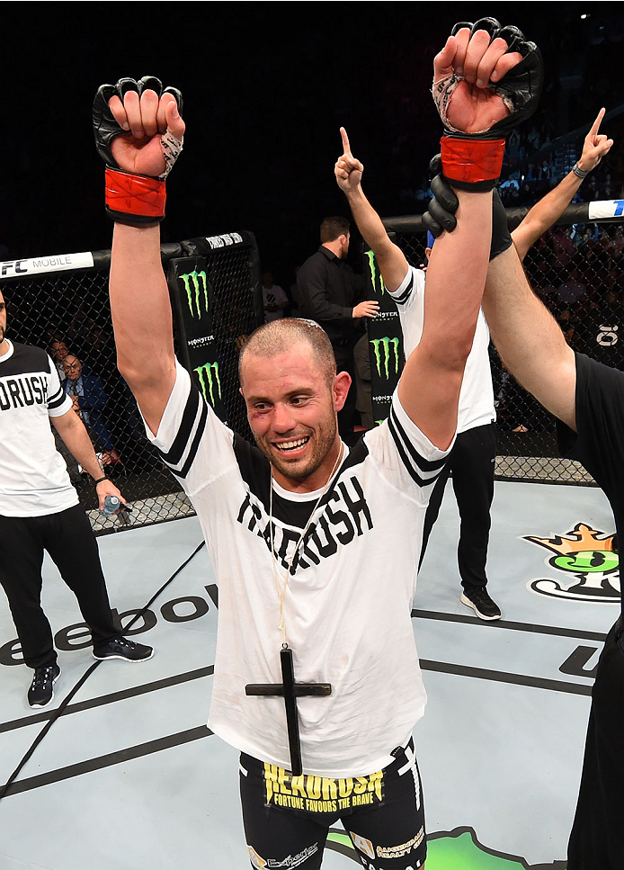 MONTREAL, QC - APRIL 25:   Chad Laprise of Canada reacts after his decision victory over Bryan Barberena of the United States in their lightweight bout during the UFC 186 event at the Bell Centre on April 25, 2015 in Montreal, Quebec, Canada. (Photo by Jo