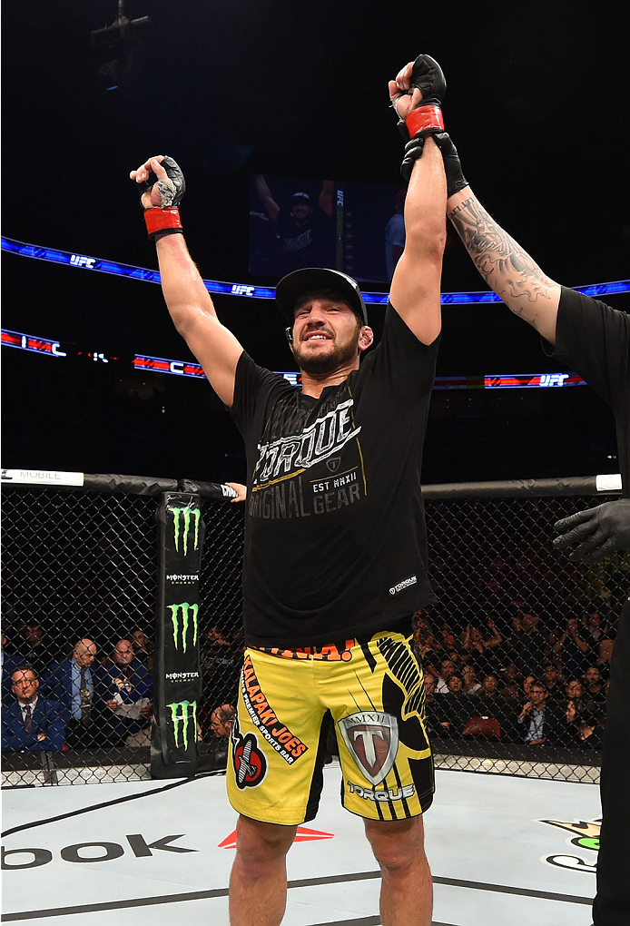 MONTREAL, QC - APRIL 25:   Patrick Cote of Canada reacts after his decision victory over Joe Riggs of the United Sates in their welterweight bout during the UFC 186 event at the Bell Centre on April 25, 2015 in Montreal, Quebec, Canada. (Photo by Josh Hed