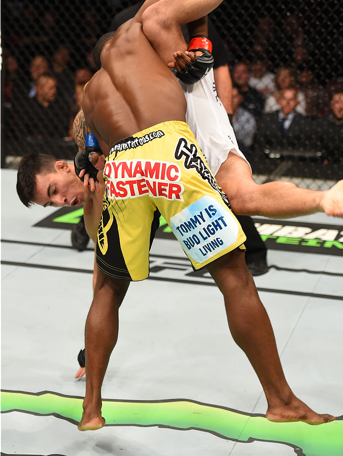 MONTREAL, QC - APRIL 25:   (L-R) Yves Jabouin of Canada takes down Thomas Almeida of Brazil in their bantamweight bout during the UFC 186 event at the Bell Centre on April 25, 2015 in Montreal, Quebec, Canada. (Photo by Josh Hedges/Zuffa LLC/Zuffa LLC via