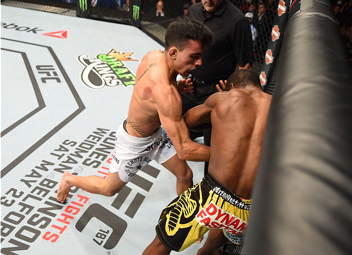 MONTREAL, QC - APRIL 25:   (L-R) Thomas Almeida of Brazil punches Yves Jabouin of Canada in their bantamweight bout during the UFC 186 event at the Bell Centre on April 25, 2015 in Montreal, Quebec, Canada. (Photo by Josh Hedges/Zuffa LLC/Zuffa LLC via Ge