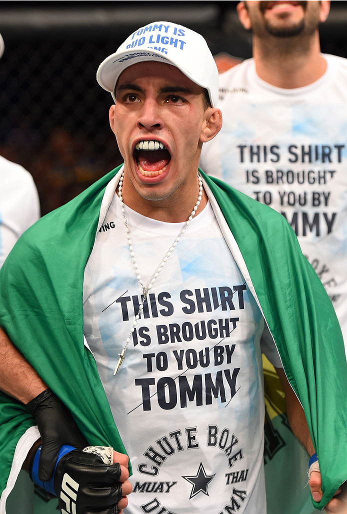 MONTREAL, QC - APRIL 25:   Thomas Almeida of Brazil reacts after his TKO victory over Yves Jabouin of Canada in their bantamweight bout during the UFC 186 event at the Bell Centre on April 25, 2015 in Montreal, Quebec, Canada. (Photo by Josh Hedges/Zuffa 