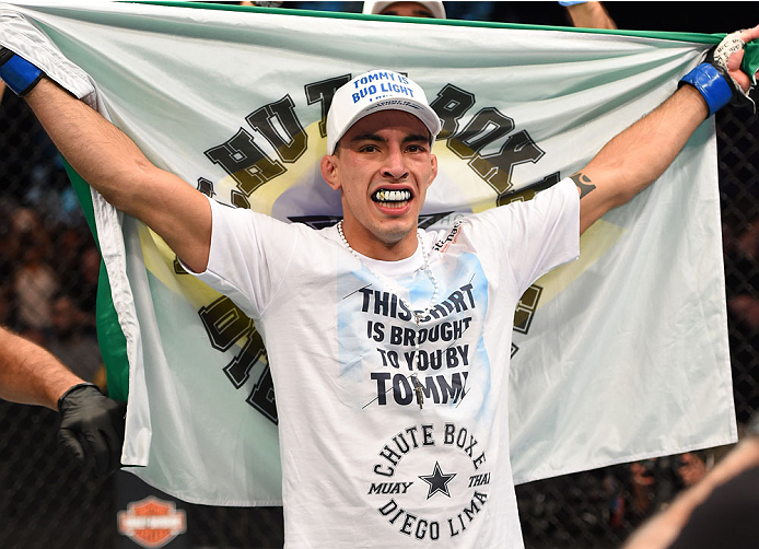 MONTREAL, QC - APRIL 25:  Thomas Almeida of Brazil reacts after his TKO victory over Yves Jabouin of Canada in their bantamweight bout during the UFC 186 event at the Bell Centre on April 25, 2015 in Montreal, Quebec, Canada. (Photo by Josh Hedges/Zuffa L