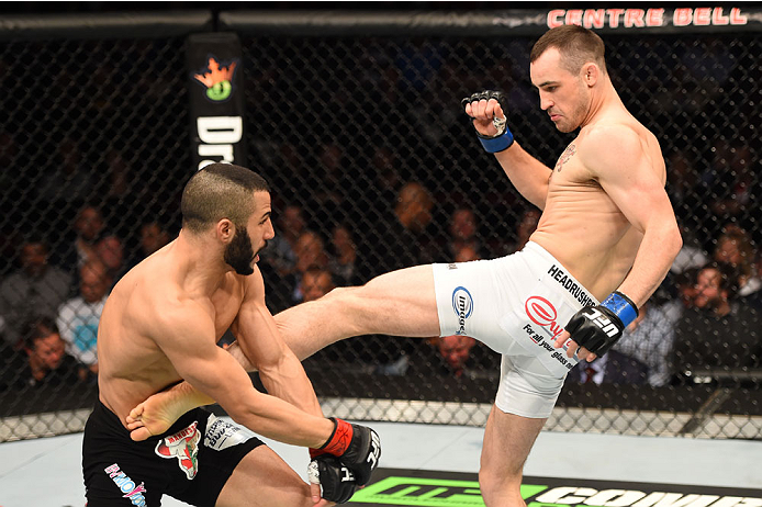 MONTREAL, QC - APRIL 25:   (R-L) Shane Campbell of the United States kicks John Makdessi of Canada in their catchweight bout during the UFC 186 event at the Bell Centre on April 25, 2015 in Montreal, Quebec, Canada. (Photo by Josh Hedges/Zuffa LLC/Zuffa L