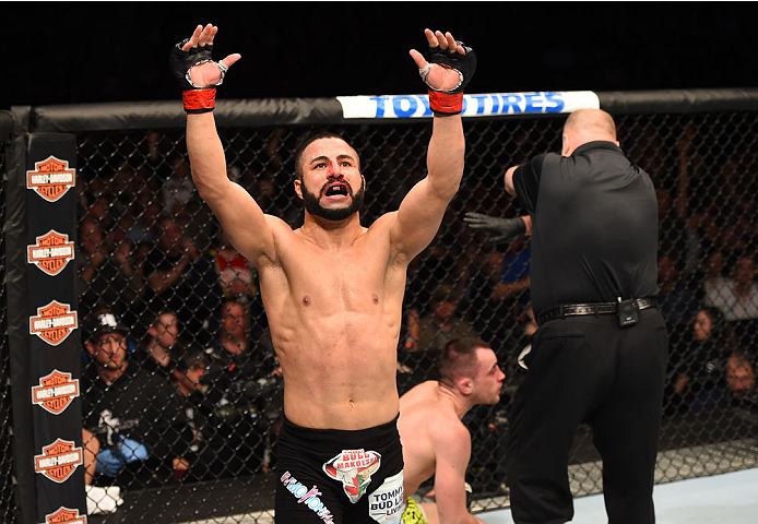 MONTREAL, QC - APRIL 25:   John Makdessi of Canada reacts after his TKO victory over Shane Campbell of the United States in their catchweight bout during the UFC 186 event at the Bell Centre on April 25, 2015 in Montreal, Quebec, Canada. (Photo by Josh He