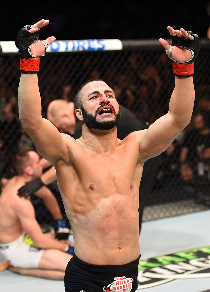 MONTREAL, QC - APRIL 25:   John Makdessi of Canada reacts after his TKO victory over Shane Campbell of the United States in their catchweight bout during the UFC 186 event at the Bell Centre on April 25, 2015 in Montreal, Quebec, Canada. (Photo by Josh He