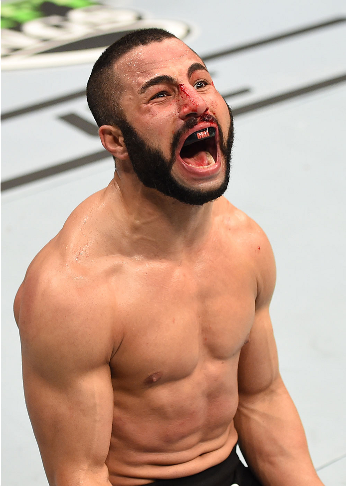 MONTREAL, QC - APRIL 25:   John Makdessi of Canada reacts after his TKO victory over Shane Campbell of the United States in their catchweight bout during the UFC 186 event at the Bell Centre on April 25, 2015 in Montreal, Quebec, Canada. (Photo by Josh He