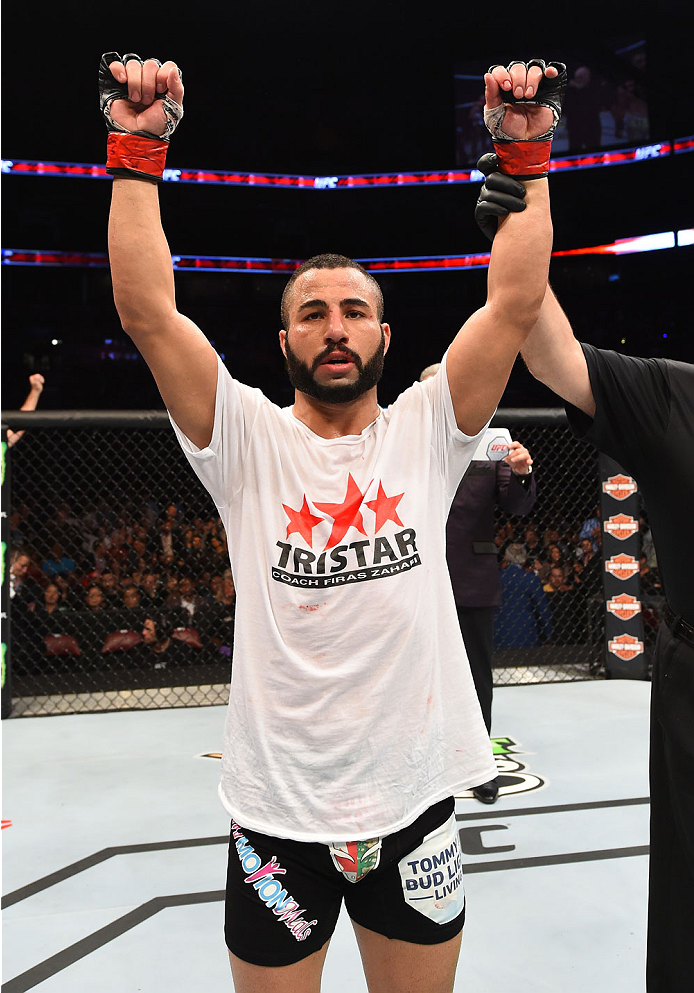 MONTREAL, QC - APRIL 25: John Makdessi of Canada reacts after his TKO victory over Shane Campbell of the United States in their catchweight bout during the UFC 186 event at the Bell Centre on April 25, 2015 in Montreal, Quebec, Canada. (Photo by Josh He