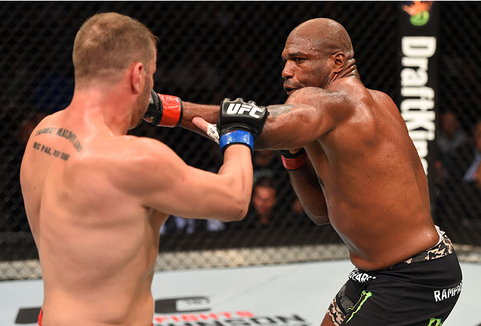 MONTREAL, QC - APRIL 25:   (R-L) Quinton 'Rampage' Jackson of the United States punches Fabio Maldonado of Brazil in their catchweight bout during the UFC 186 event at the Bell Centre on April 25, 2015 in Montreal, Quebec, Canada. (Photo by Josh Hedges/Zu