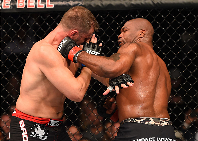 MONTREAL, QC - APRIL 25:   (R-L) Quinton 'Rampage' Jackson of the United States punches Fabio Maldonado of Brazil in their catchweight bout during the UFC 186 event at the Bell Centre on April 25, 2015 in Montreal, Quebec, Canada. (Photo by Josh Hedges/Zu