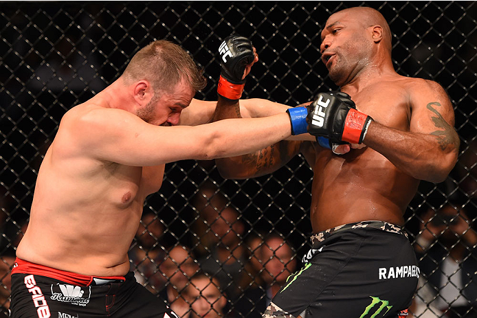 MONTREAL, QC - APRIL 25:   (R-L) Quinton 'Rampage' Jackson of the United States punches Fabio Maldonado of Brazil in their catchweight bout during the UFC 186 event at the Bell Centre on April 25, 2015 in Montreal, Quebec, Canada. (Photo by Josh Hedges/Zu