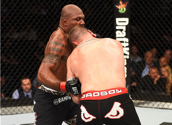 MONTREAL, QC - APRIL 25:   (L-R) Quinton 'Rampage' Jackson of the United States punches Fabio Maldonado of Brazil in their catchweight bout during the UFC 186 event at the Bell Centre on April 25, 2015 in Montreal, Quebec, Canada. (Photo by Josh Hedges/Zu