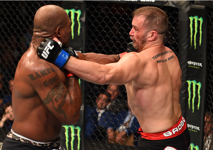 MONTREAL, QC - APRIL 25:   (L-R) Quinton 'Rampage' Jackson of the United States punches Fabio Maldonado of Brazil in their catchweight bout during the UFC 186 event at the Bell Centre on April 25, 2015 in Montreal, Quebec, Canada. (Photo by Josh Hedges/Zu