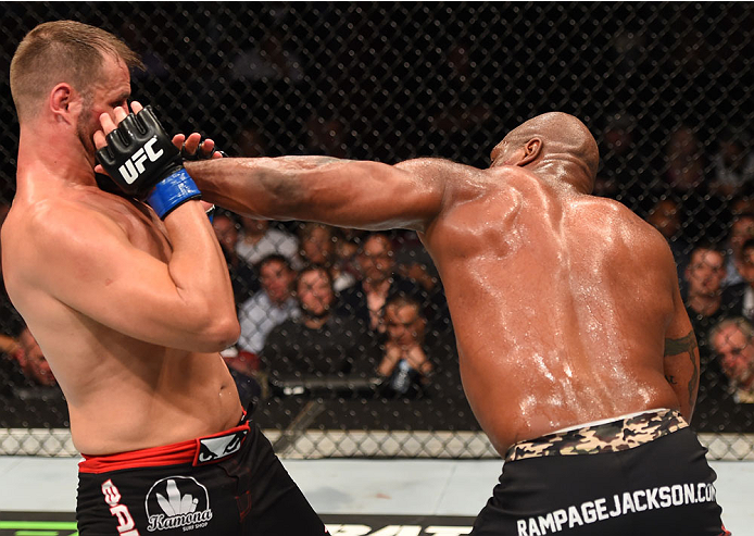 MONTREAL, QC - APRIL 25:   (R-L) Quinton 'Rampage' Jackson of the United States punches Fabio Maldonado of Brazil in their catchweight bout during the UFC 186 event at the Bell Centre on April 25, 2015 in Montreal, Quebec, Canada. (Photo by Josh Hedges/Zu