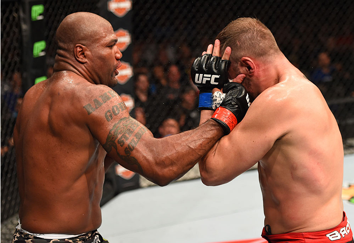 MONTREAL, QC - APRIL 25:   (L-R) Quinton 'Rampage' Jackson of the United States punches Fabio Maldonado of Brazil in their catchweight bout during the UFC 186 event at the Bell Centre on April 25, 2015 in Montreal, Quebec, Canada. (Photo by Josh Hedges/Zu