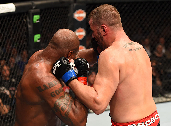 MONTREAL, QC - APRIL 25: (R-L) Fabio Maldonado of Brazil punches Quinton 'Rampage' Jackson of the United States in their catchweight bout during the UFC 186 event at the Bell Centre on April 25, 2015 in Montreal, Quebec, Canada. (Photo by Josh Hedges/Zu