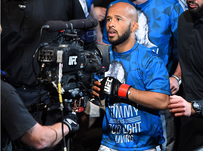 MONTREAL, QC - APRIL 25:   Demetrious Johnson of the United States enters the arena before his UFC flyweight championship bout against Kyoji Horiguchi during the UFC 186 event at the Bell Centre on April 25, 2015 in Montreal, Quebec, Canada. (Photo by Jos