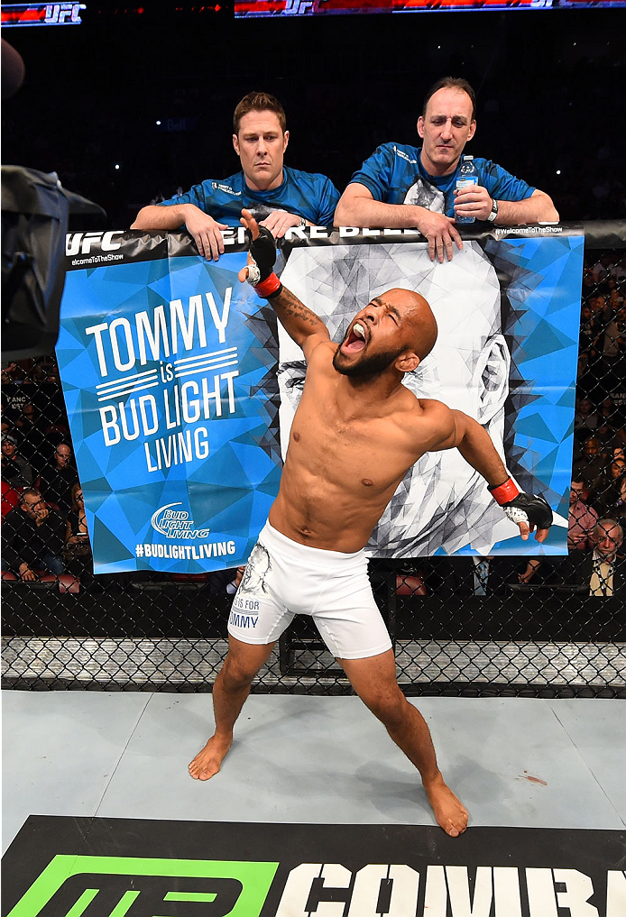 MONTREAL, QC - APRIL 25: Demetrious Johnson of the United States stands in the Octagon before his UFC flyweight championship bout against Kyoji Horiguchi during the UFC 186 event at the Bell Centre on April 25, 2015 in Montreal, Quebec, Canada. (Photo b