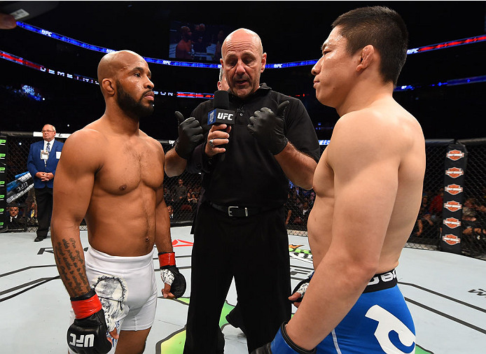 MONTREAL, QC - APRIL 25:   (L-R) Opponents Demetrious Johnson of the United States and Kyoji Horiguchi of Japan face off before their UFC flyweight championship bout during the UFC 186 event at the Bell Centre on April 25, 2015 in Montreal, Quebec, Canada