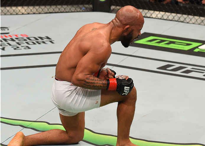 MONTREAL, QC - APRIL 25: Demetrious Johnson of the United States reacts after his submission victory over Kyoji Horiguchi of Japan in their UFC flyweight championship bout during the UFC 186 event at the Bell Centre on April 25, 2015 in Montreal, Quebec