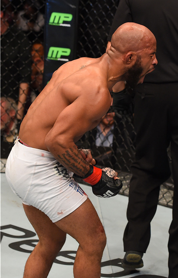 MONTREAL, QC - APRIL 25:   Demetrious Johnson of the United States reacts after his submission victory over Kyoji Horiguchi of Japan in their UFC flyweight championship bout during the UFC 186 event at the Bell Centre on April 25, 2015 in Montreal, Quebec