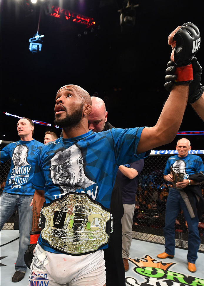 MONTREAL, QC - APRIL 25:   Demetrious Johnson of the United States reacts after his submission victory over Kyoji Horiguchi of Japan in their UFC flyweight championship bout during the UFC 186 event at the Bell Centre on April 25, 2015 in Montreal, Quebec