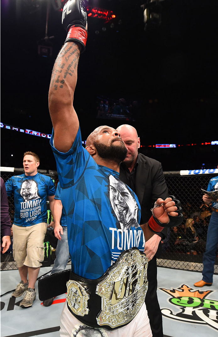 MONTREAL, QC - APRIL 25:   Demetrious Johnson of the United States reacts after his submission victory over Kyoji Horiguchi of Japan in their UFC flyweight championship bout during the UFC 186 event at the Bell Centre on April 25, 2015 in Montreal, Quebec