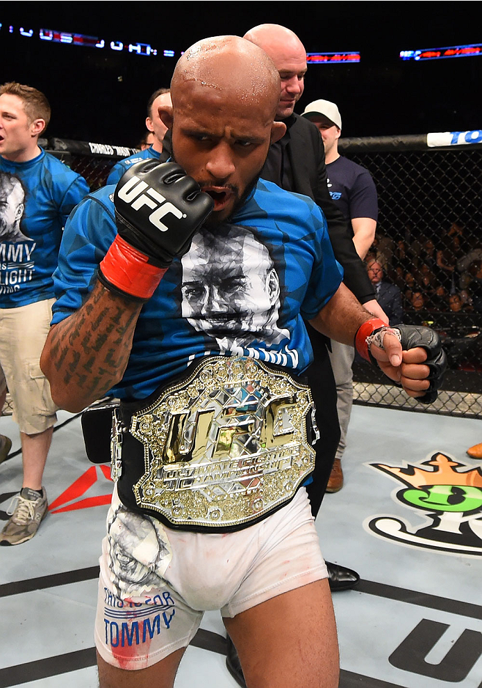 MONTREAL, QC - APRIL 25:   Demetrious Johnson of the United States reacts after his submission victory over Kyoji Horiguchi of Japan in their UFC flyweight championship bout during the UFC 186 event at the Bell Centre on April 25, 2015 in Montreal, Quebec