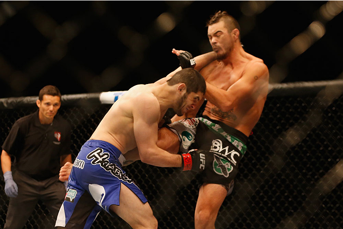 LAS VEGAS, NV - MAY 23: Islam Makhachev of Russia (blue shorts) punches Leo Kuntz in their lightweight bout during the UFC 187 event at the MGM Grand Garden Arena on May 23, 2015 in Las Vegas, Nevada. (Photo by Christian Petersen/Zuffa LLC/Zuffa LLC via