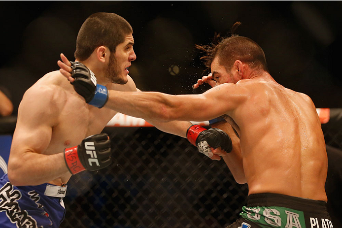 LAS VEGAS, NV - MAY 23: (L-R) Islam Makhachev of Russia punches Leo Kuntz in their lightweight bout during the UFC 187 event at the MGM Grand Garden Arena on May 23, 2015 in Las Vegas, Nevada. (Photo by Christian Petersen/Zuffa LLC/Zuffa LLC via Getty I