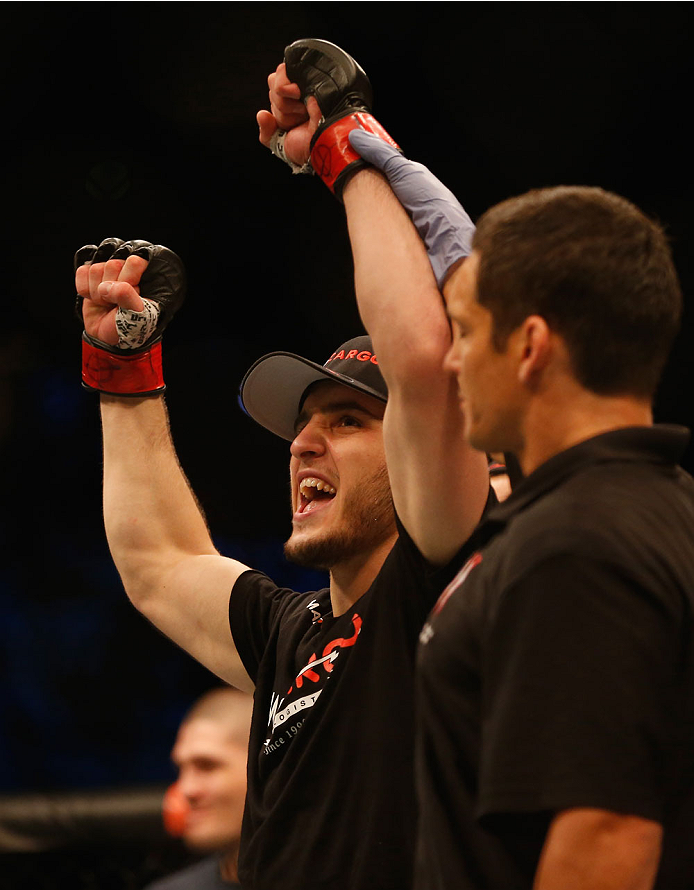 LAS VEGAS, NV - MAY 23:  Islam Makhachev of Russia (left) reacts to his victory over Leo Kuntz in their lightweight bout during the UFC 187 event at the MGM Grand Garden Arena on May 23, 2015 in Las Vegas, Nevada.  (Photo by Christian Petersen/Zuffa LLC/Z