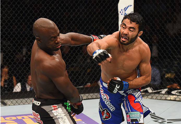 LAS VEGAS, NV - MAY 23: (R-L) Rafael Natal of Brazil punches Uriah Hall in their middleweight bout during the UFC 187 event at the MGM Grand Garden Arena on May 23, 2015 in Las Vegas, Nevada. (Photo by Josh Hedges/Zuffa LLC/Zuffa LLC via Getty Images)
