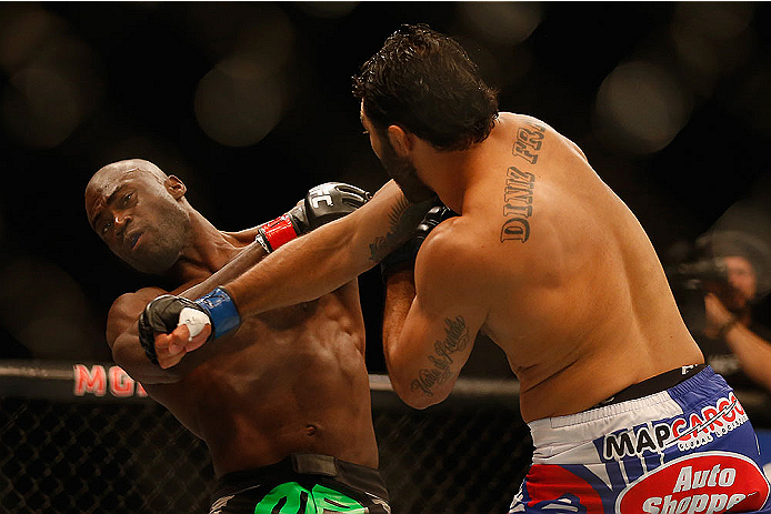 LAS VEGAS, NV - MAY 23: (R-L) Rafael Natal of Brazil punches Uriah Hall in their middleweight bout during the UFC 187 event at the MGM Grand Garden Arena on May 23, 2015 in Las Vegas, Nevada. (Photo by Christian Petersen/Zuffa LLC/Zuffa LLC via Getty Im